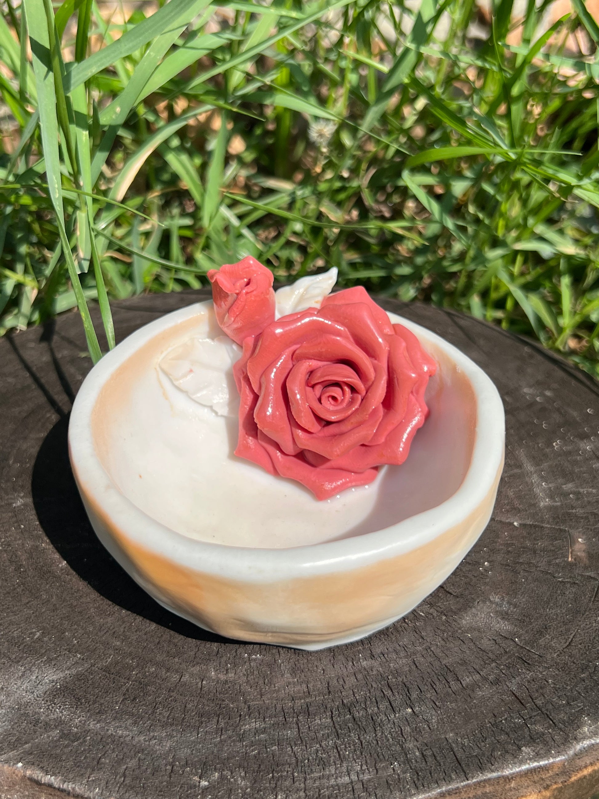 This is a woodfired pottery flower teacup