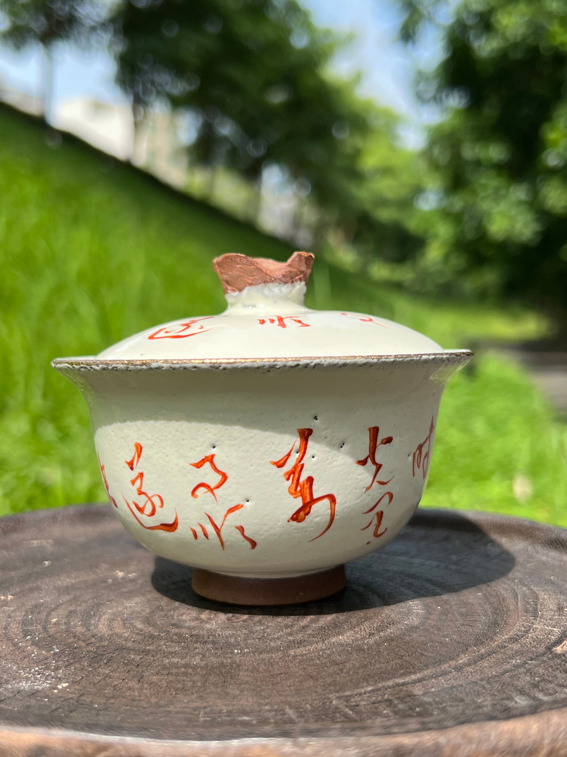 this is a pottery alum red gaiwan 