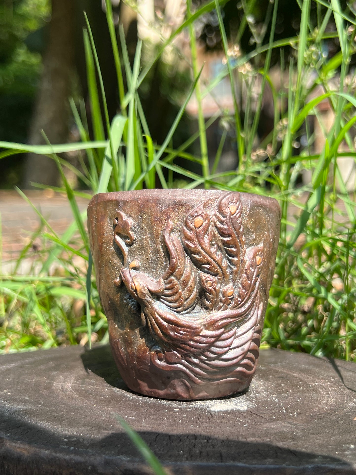 This is a woodfired tietai pottery phoenix  teacup