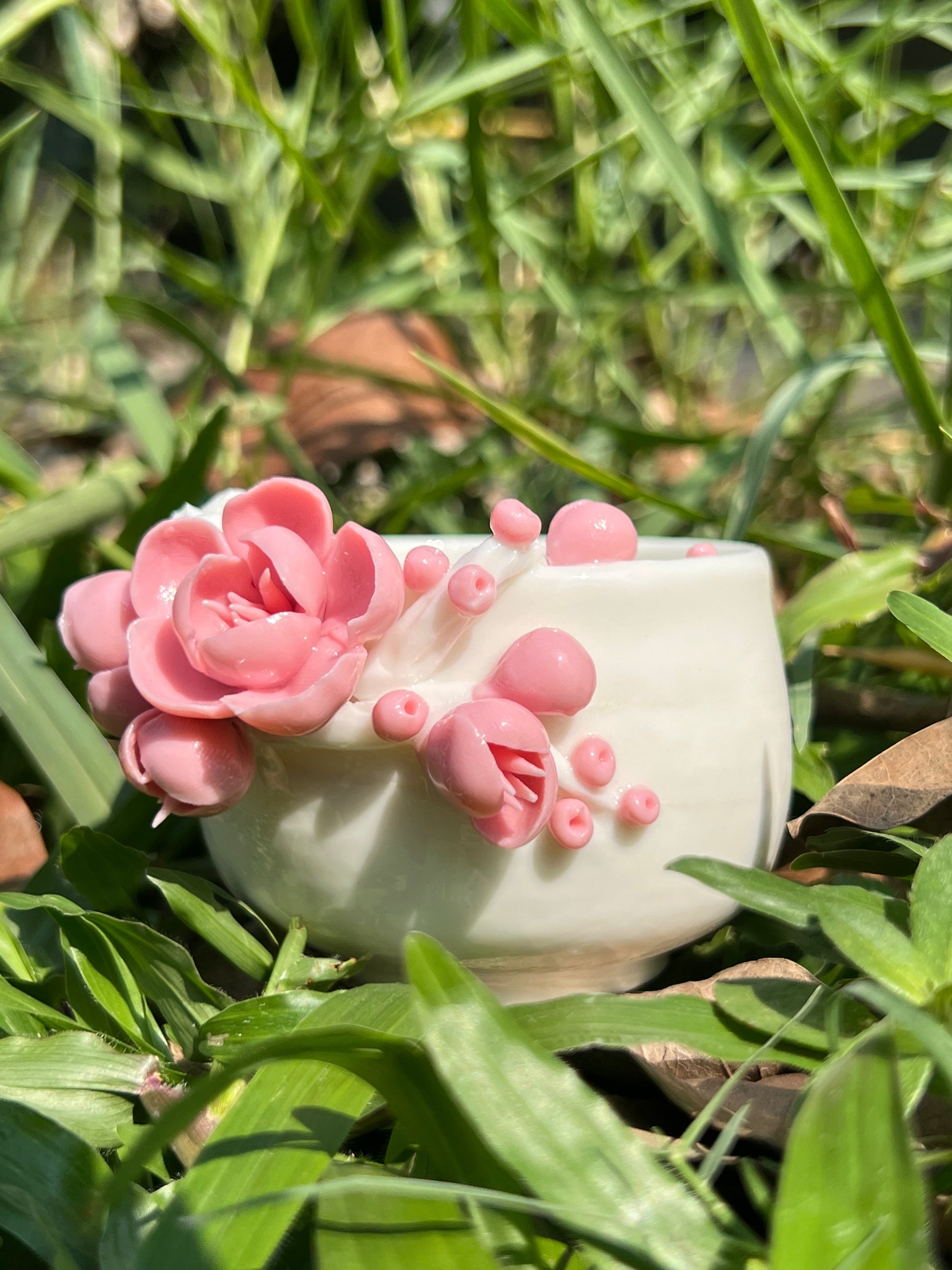 This is a woodfired white pottery flower faircup gongdaobei