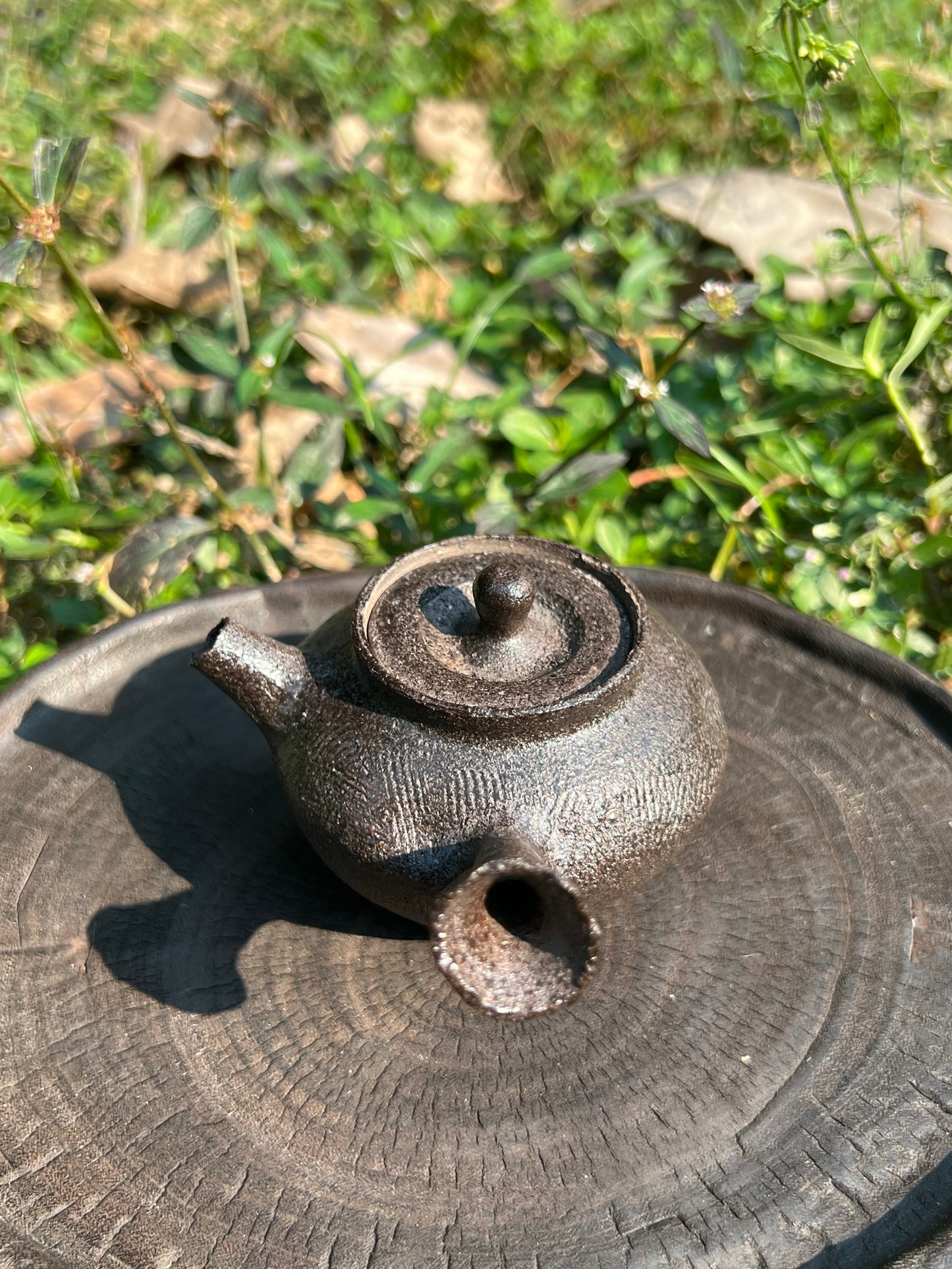 This is a pottery teapot