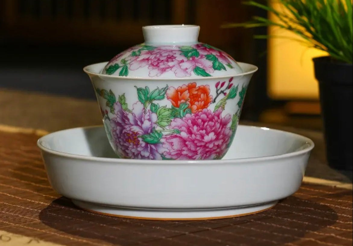 This is a Chinese Jingdezhen enamel flower teapot gaiwan