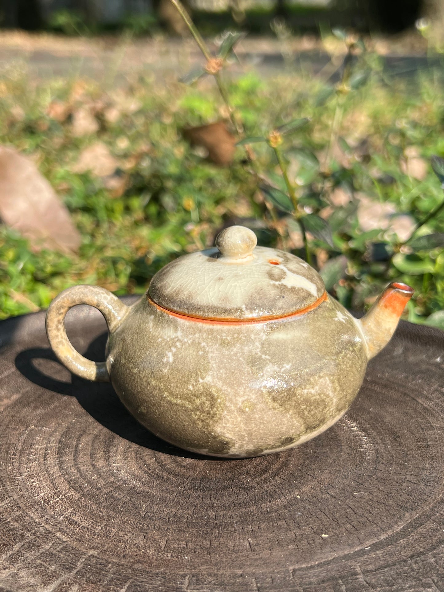 this is a ceramic teapot