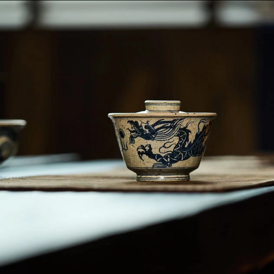 This is a Chinese Jingdezhen blue and white pottery dragon teapot gaiwan