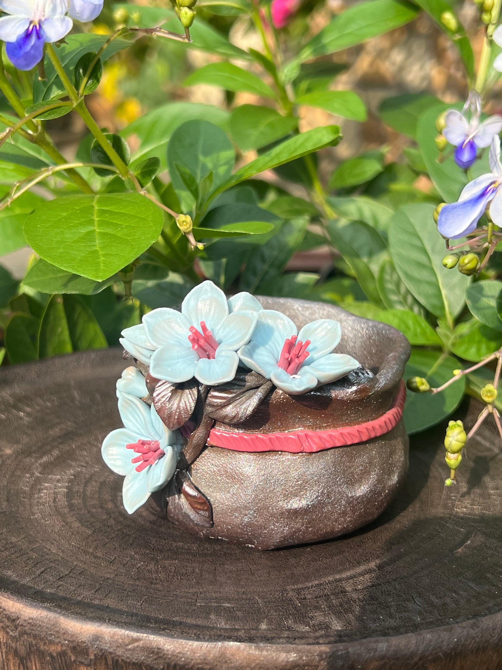 This is a woodfired tietai pottery flower teacup