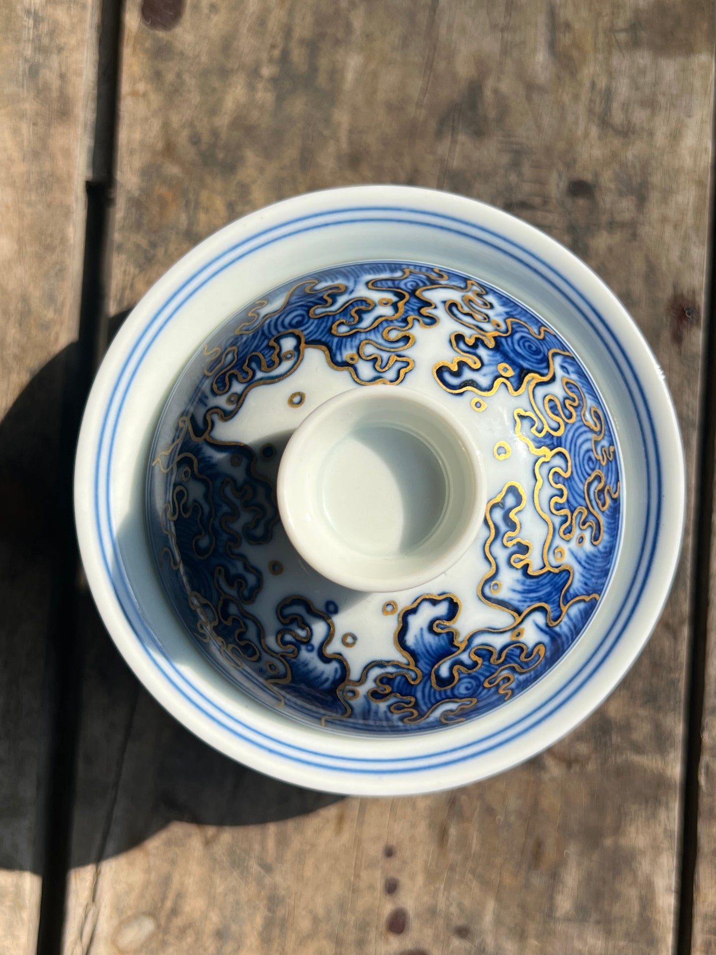 This is a Chinese Jingdezhen blue and white porcelain dragon teapot gaiwan