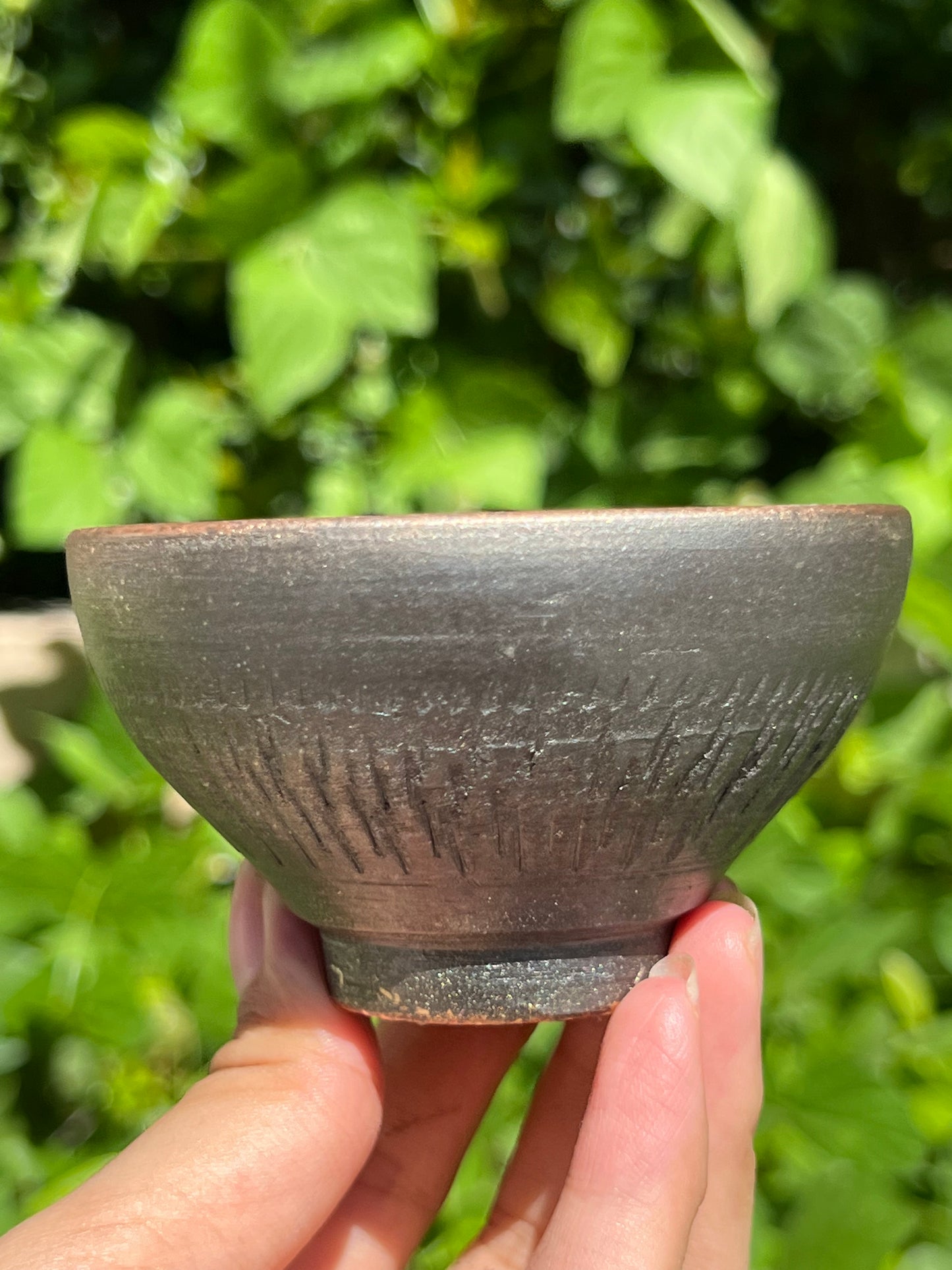 This is a woodfired tietai pottery teacup