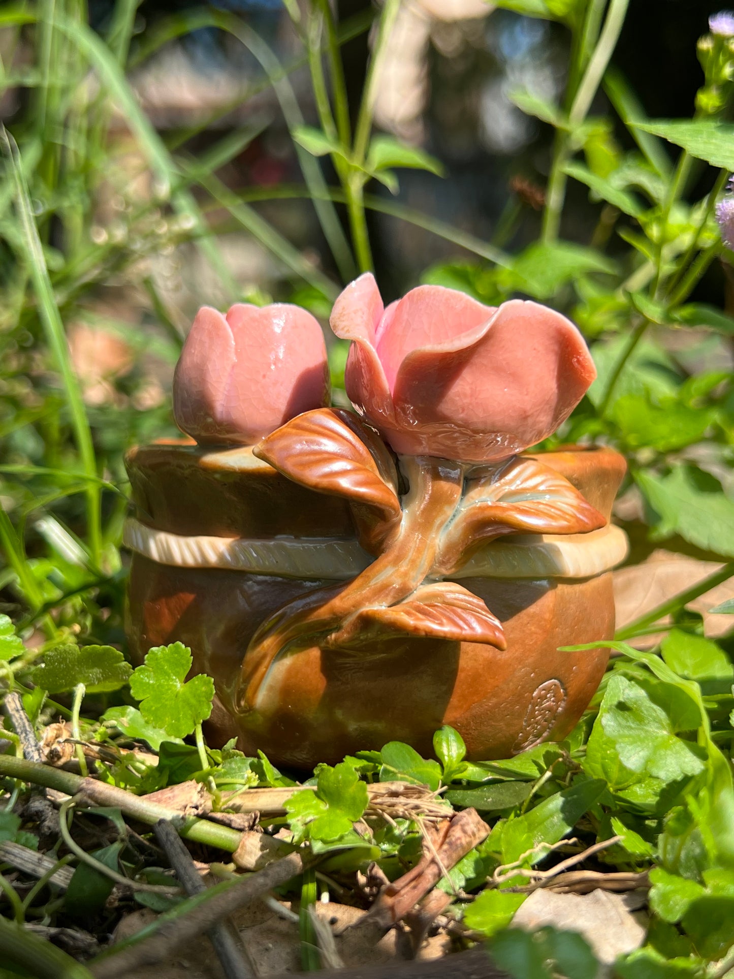 This is a woodfired pottery flower teacup