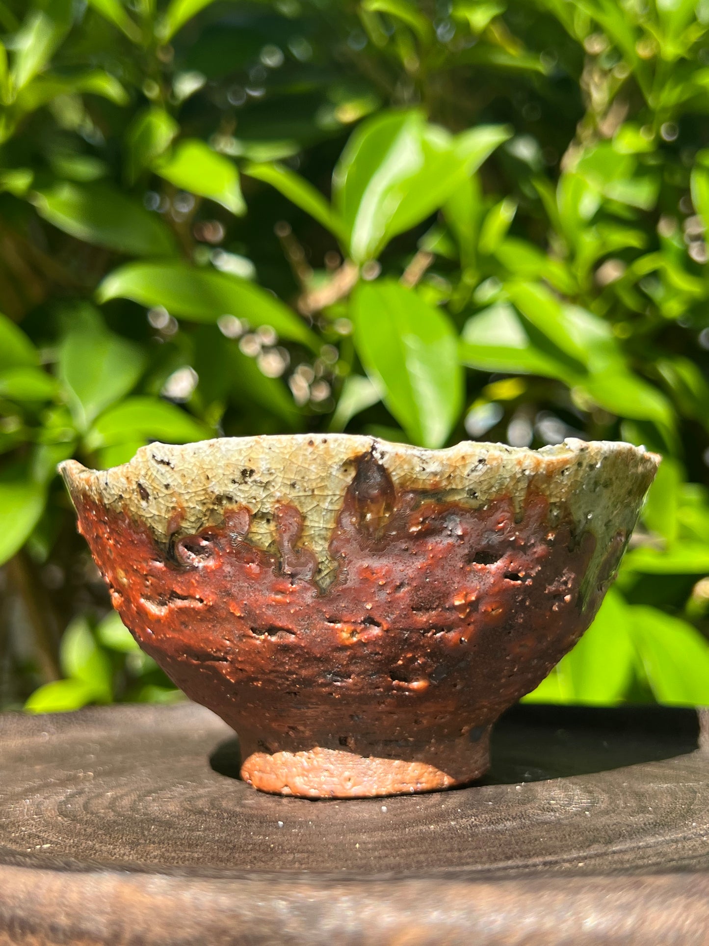 This is a woodfired pottery flower teacup