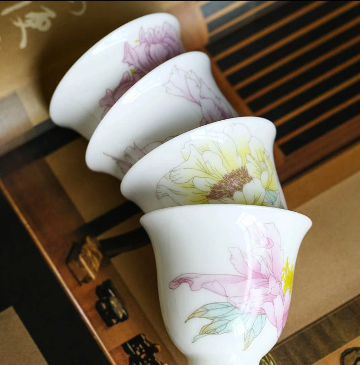 This is a Chinese Jingdezhen pastel flower teacup