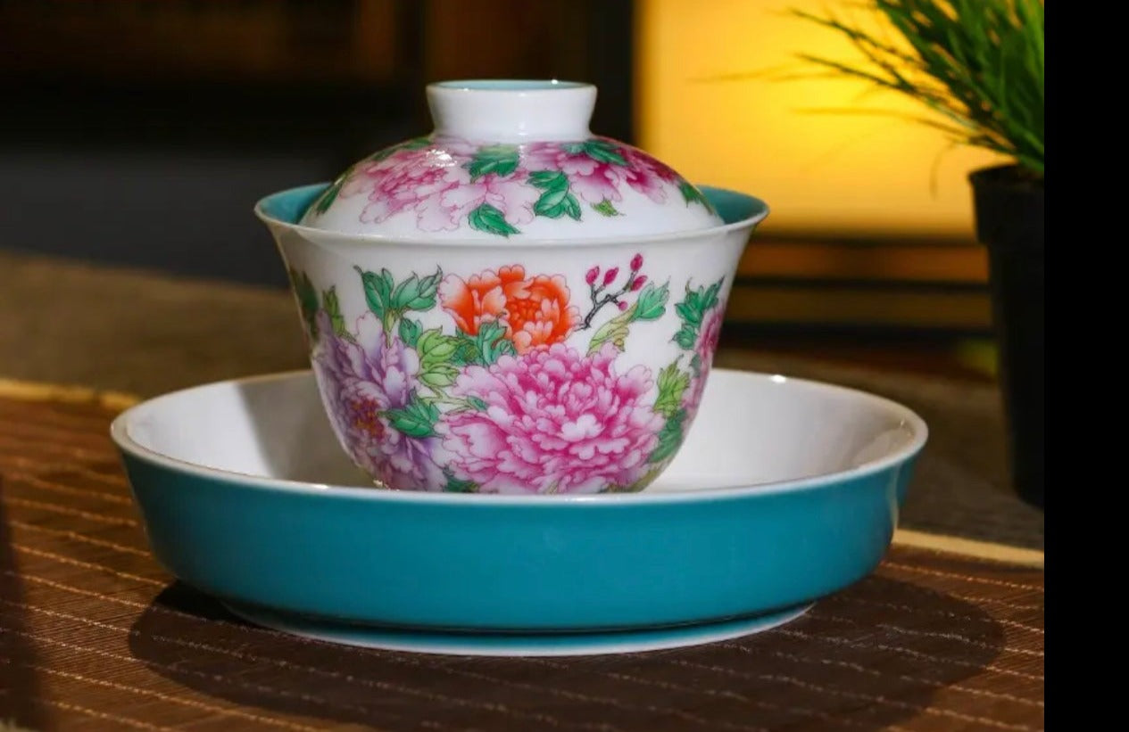 This is a Chinese Jingdezhen enamel flower teapot gaiwan