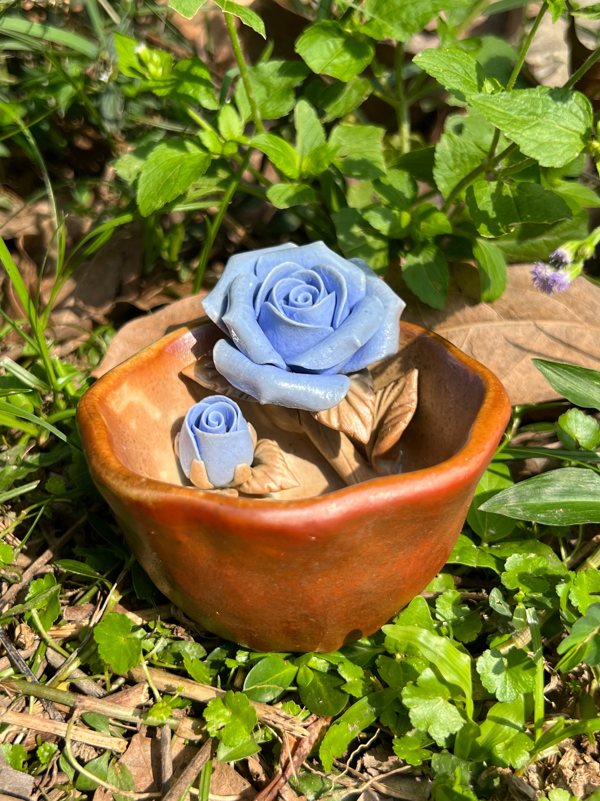 This is a woodfired pottery flower teacup