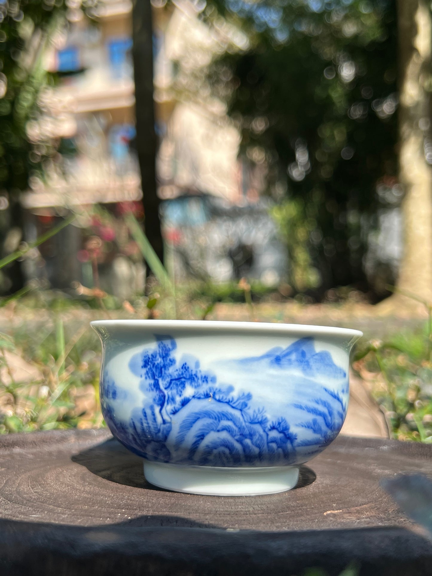 This is a Chinese Jingdezhen blue and white porcelain landscape teacup