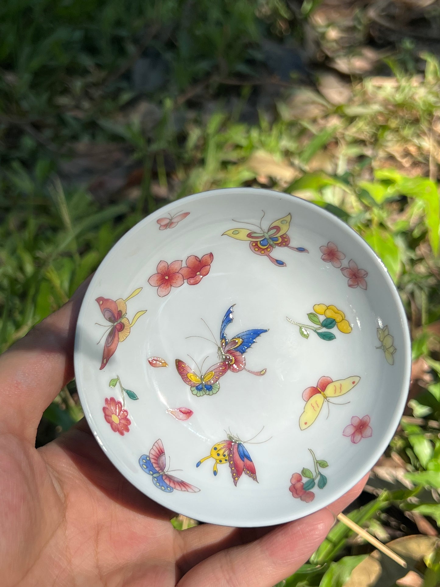 this is Chinese Jingdezhen enamel butterfly teacup. this is a ceramic teacup