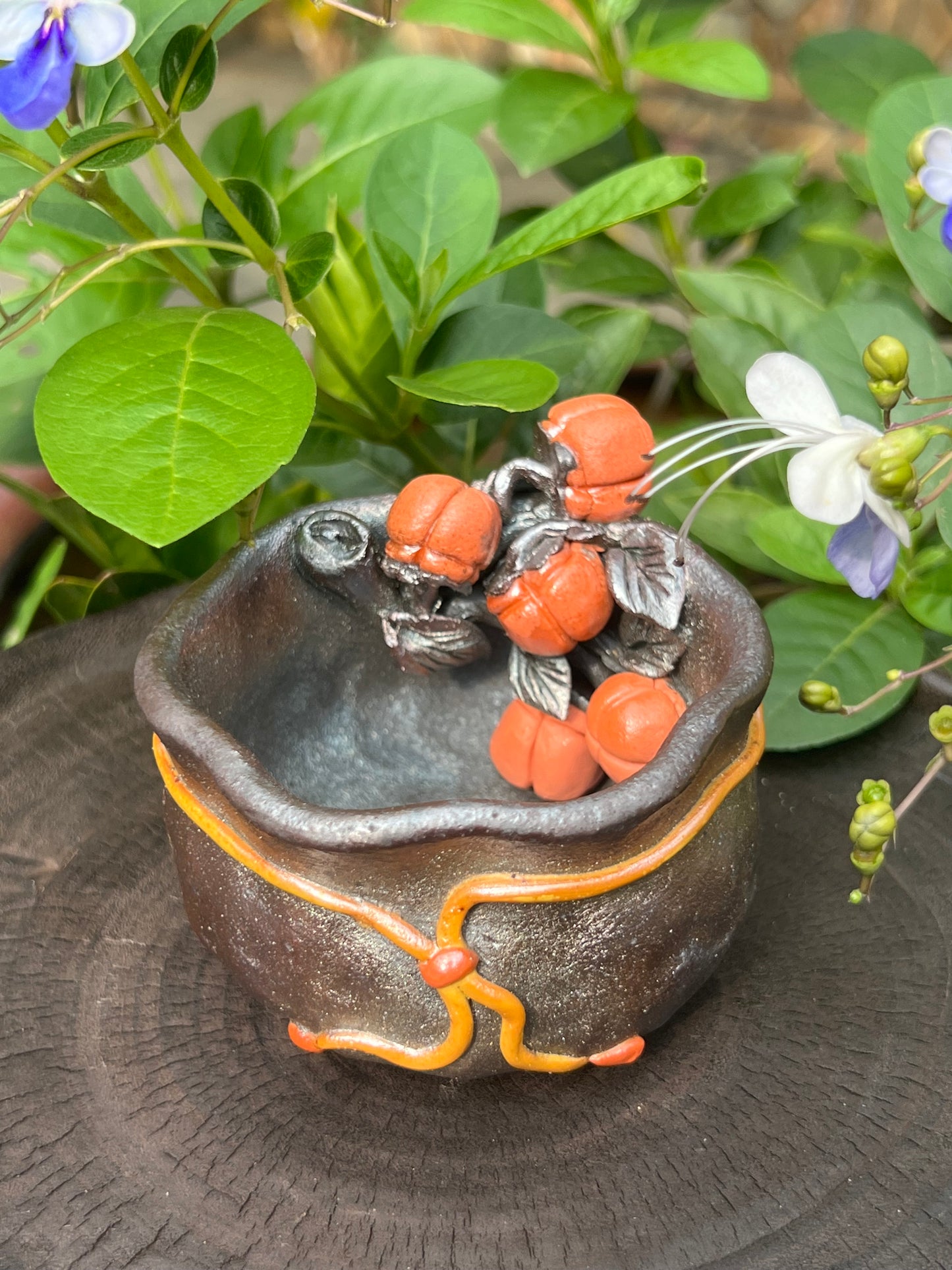 This is a woodfired tietai pottery flower teacup