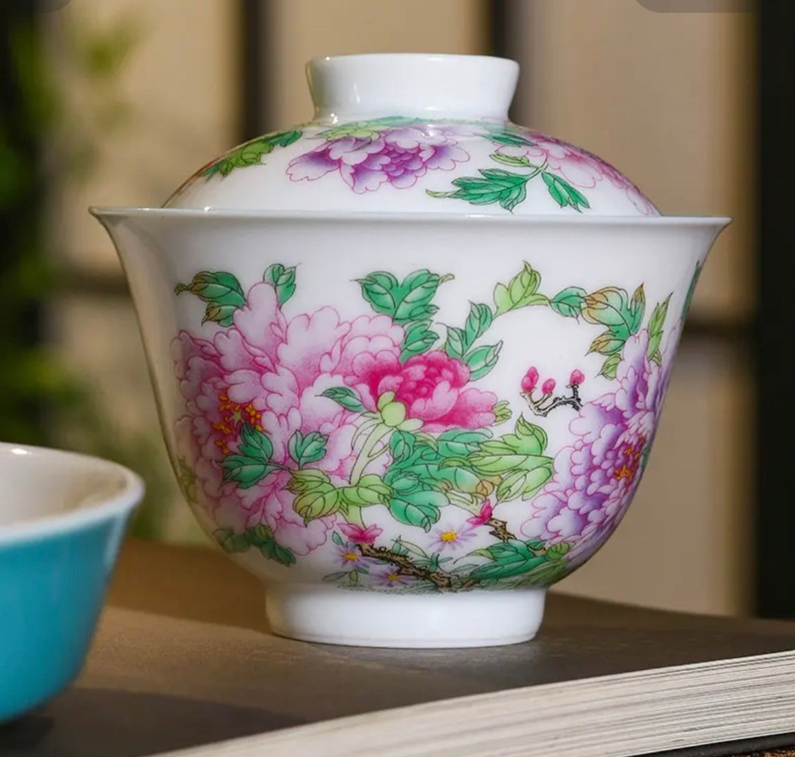 This is a Chinese Jingdezhen enamel flower teapot gaiwan