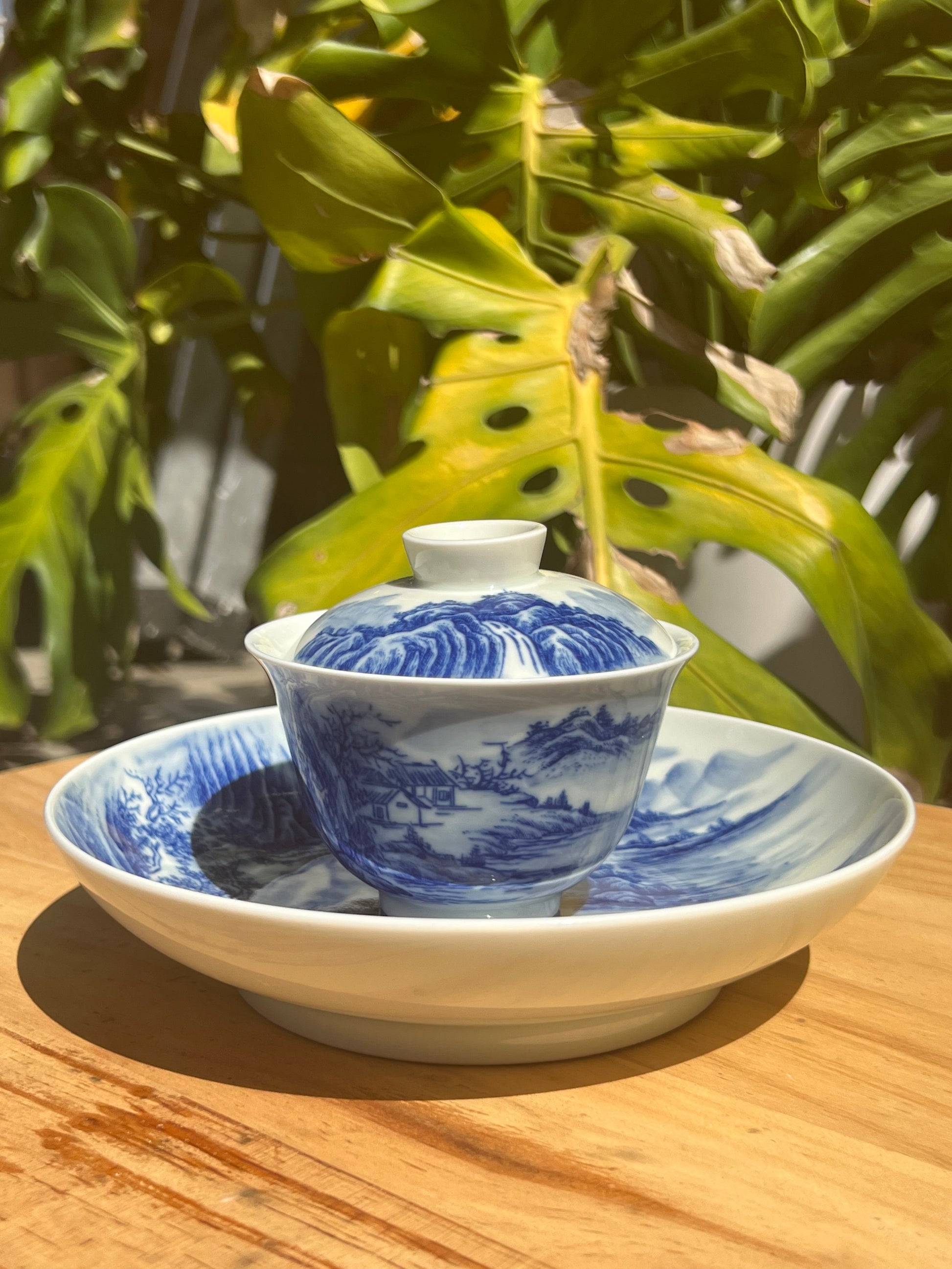 This is a Chinese Jingdezhen blue and white porcelain landscape teapot gaiwan