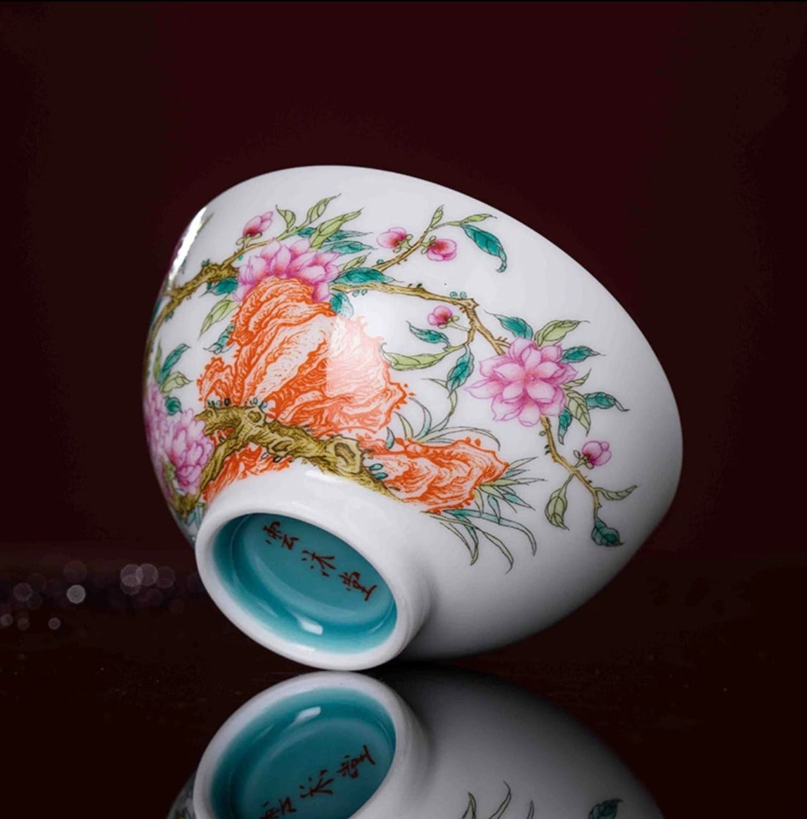 This is a Chinese Jingdezhen enamel flower teacup