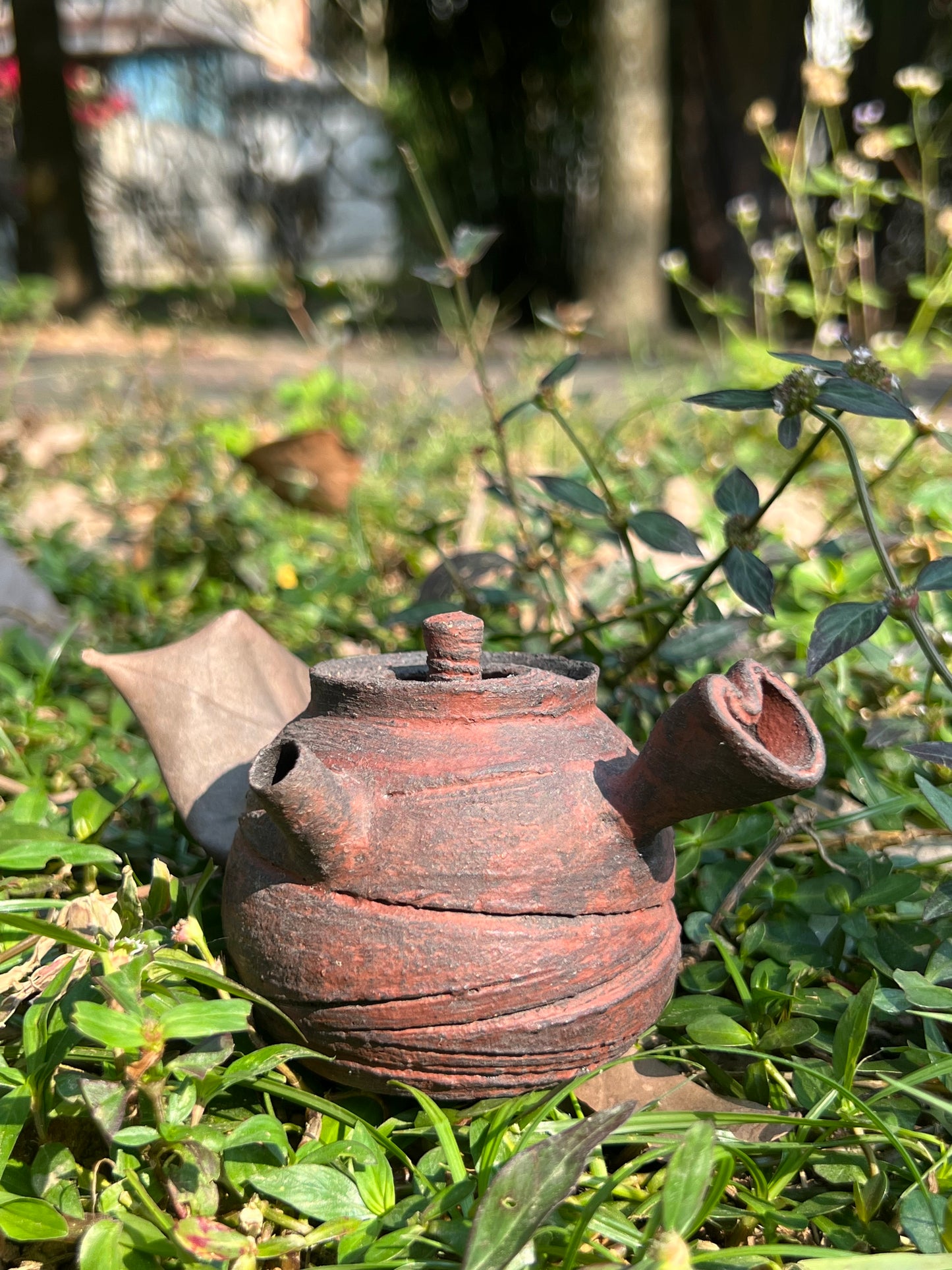 This is a pottery teapot