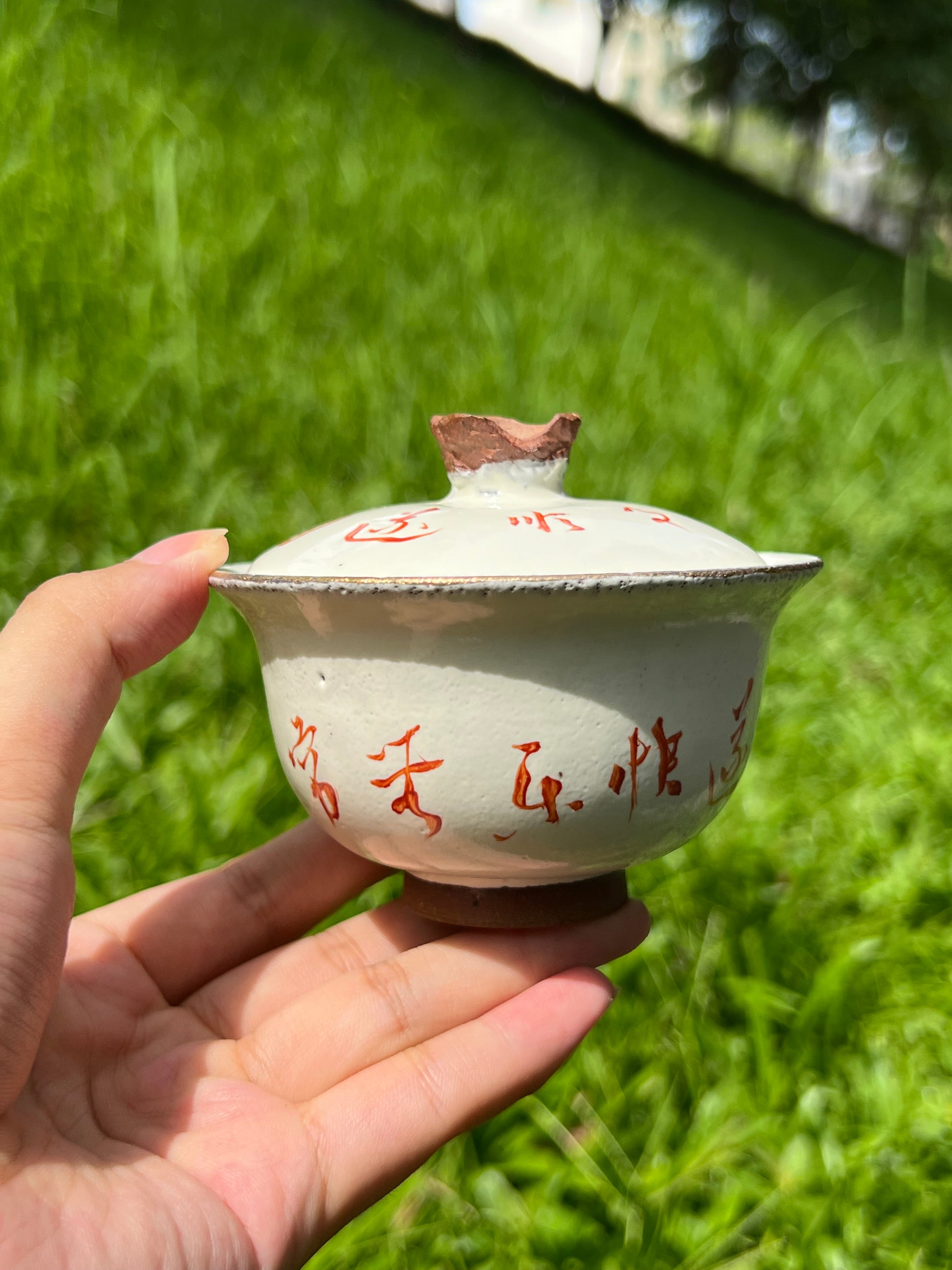 this is a pottery alum red gaiwan 