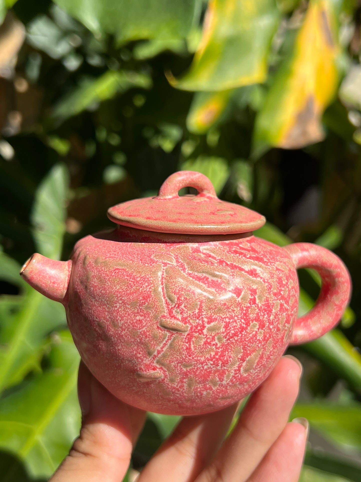 this is a ceramic teapot