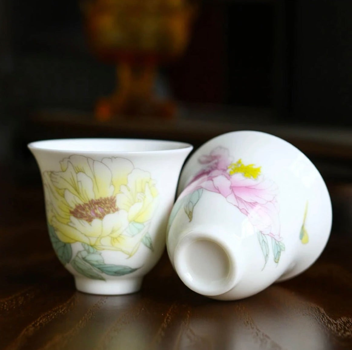 This is a Chinese Jingdezhen pastel flower teacup