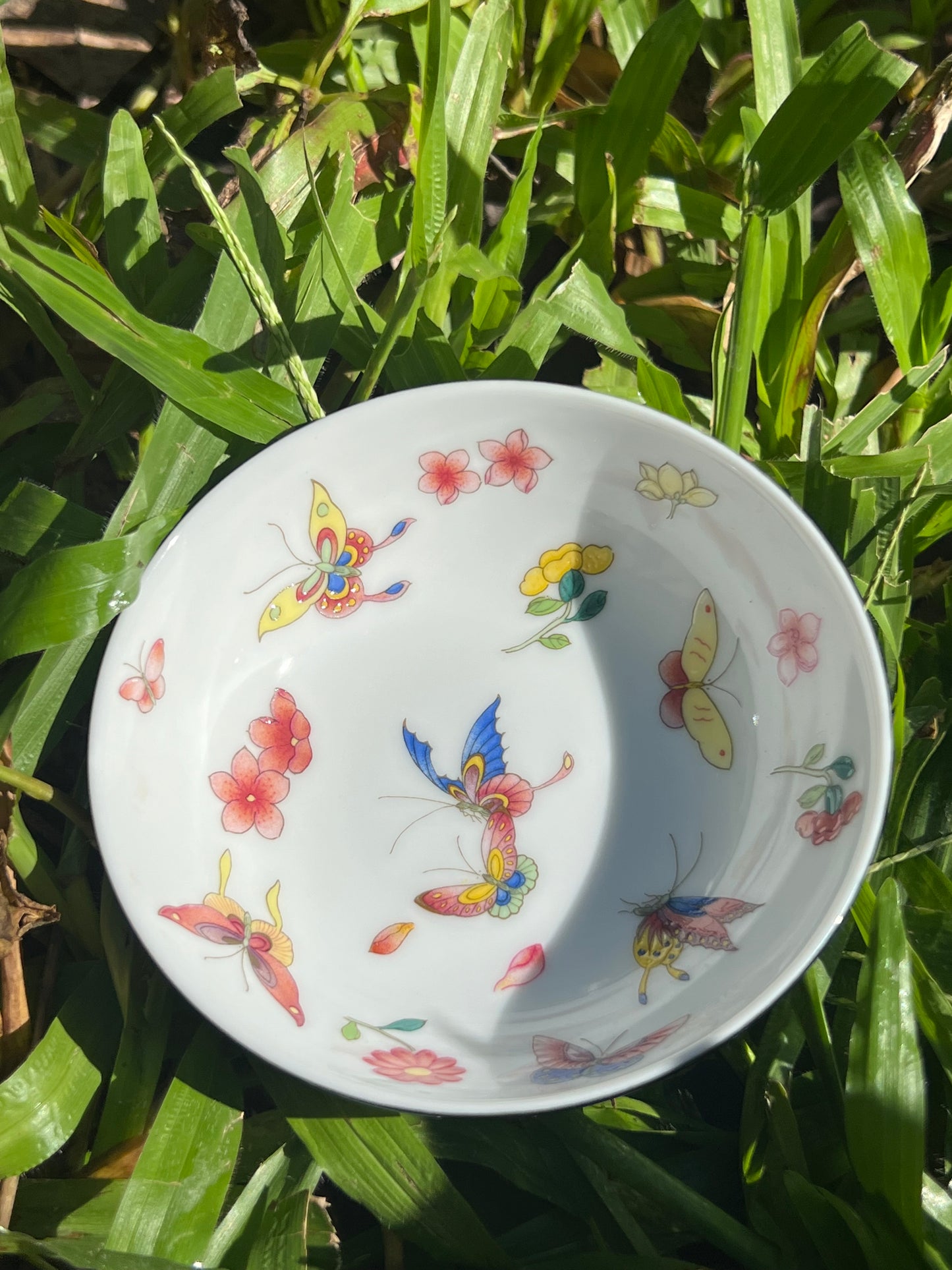 this is Chinese Jingdezhen enamel butterfly teacup. this is a ceramic teacup