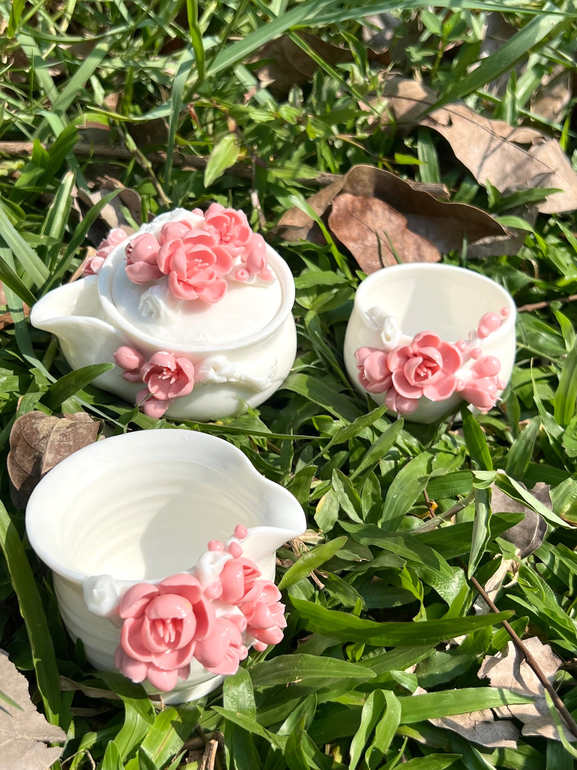 This is a woodfired white pottery flower faircup gongdaobei