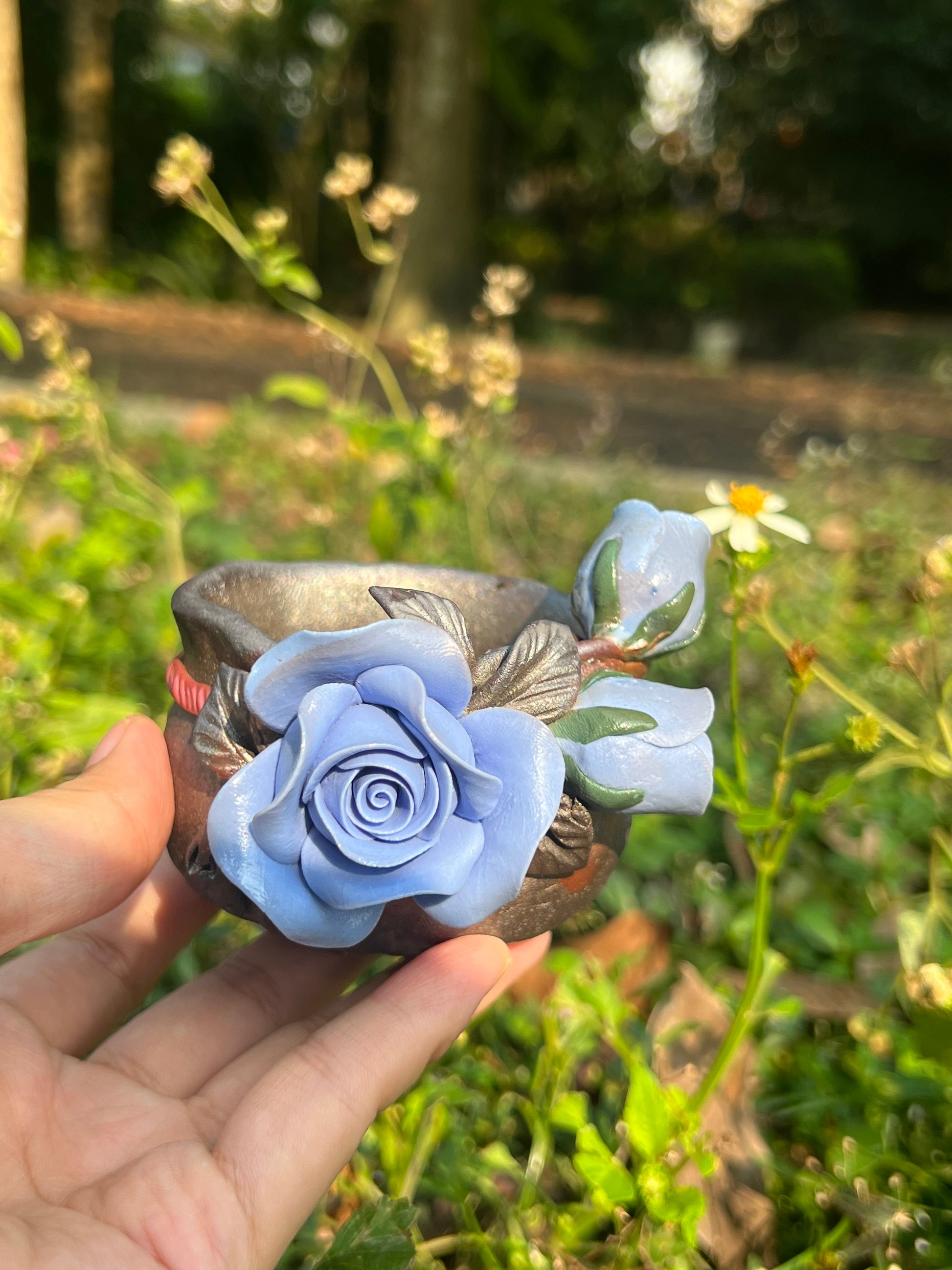 This is a woodfired tietai pottery flower teacup