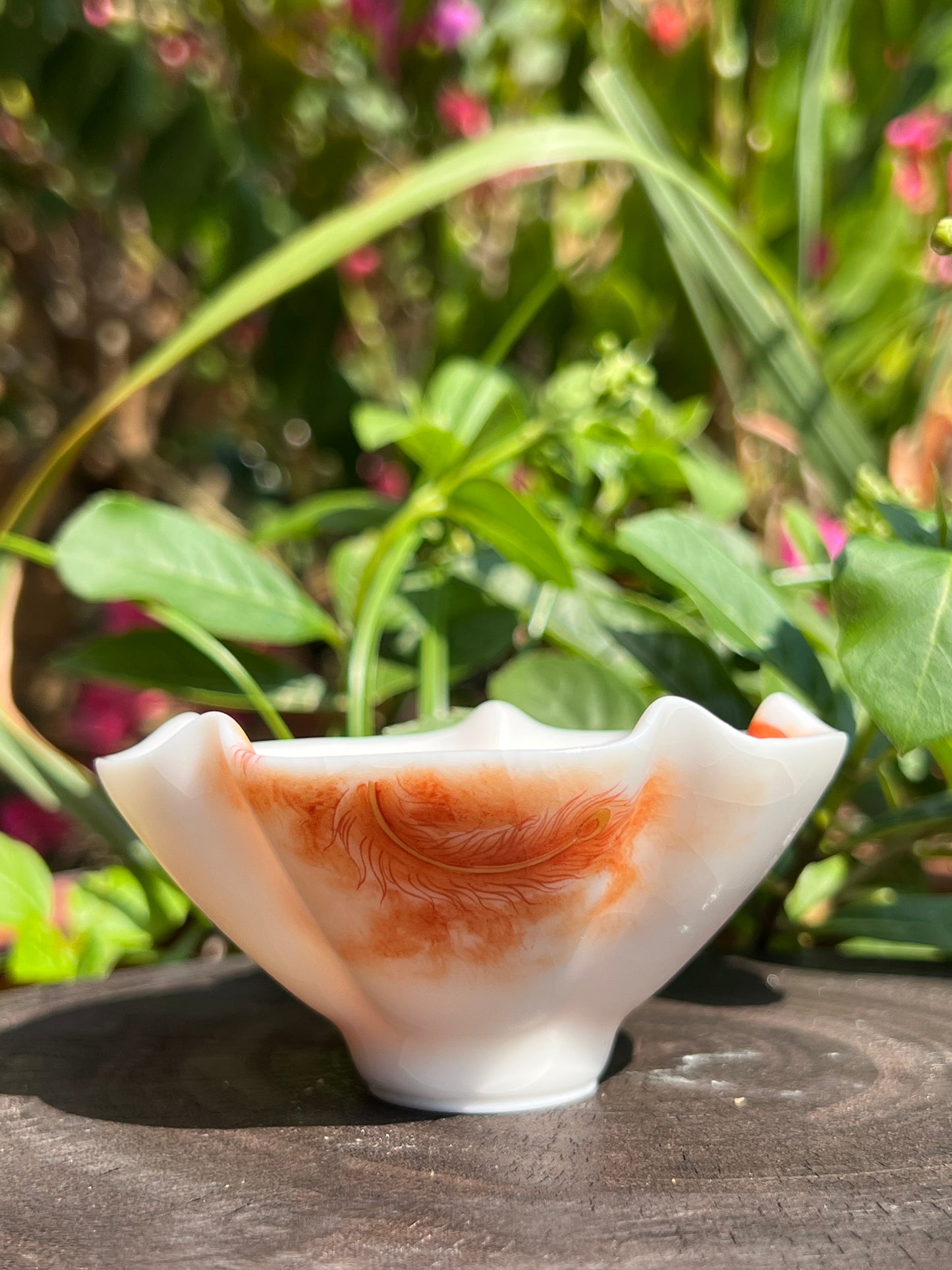 this is a Chinese Jingdezhen alum red phoenix teacup.this is a ceramic teacup