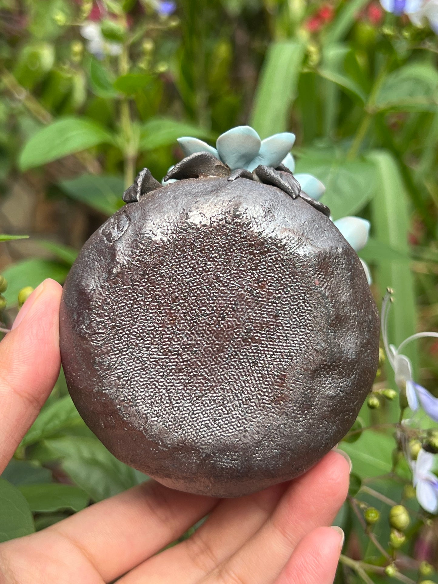 This is a woodfired tietai pottery flower teacup