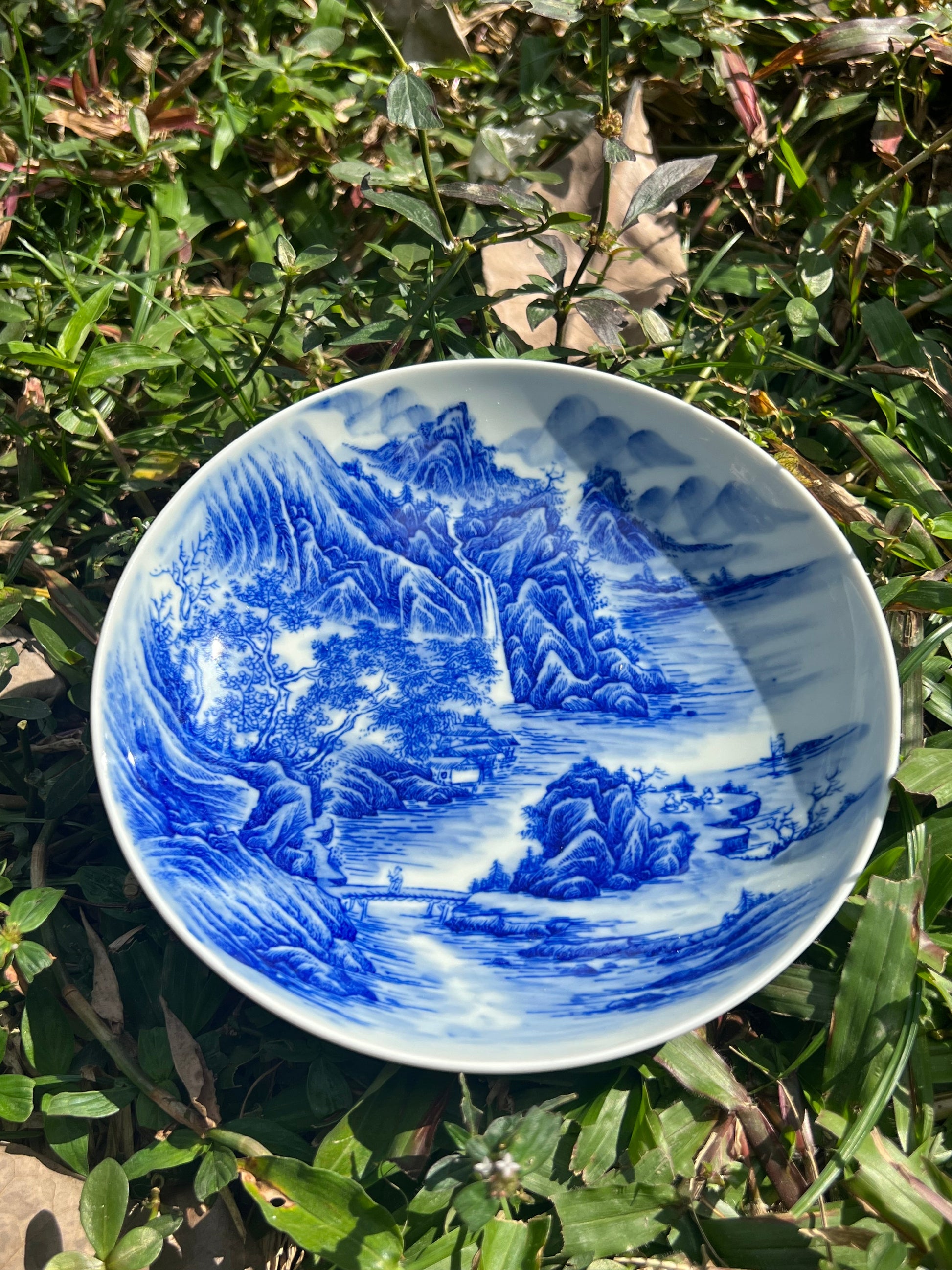 This is a Chinese Jingdezhen blue and white porcelain landscape teapot gaiwan