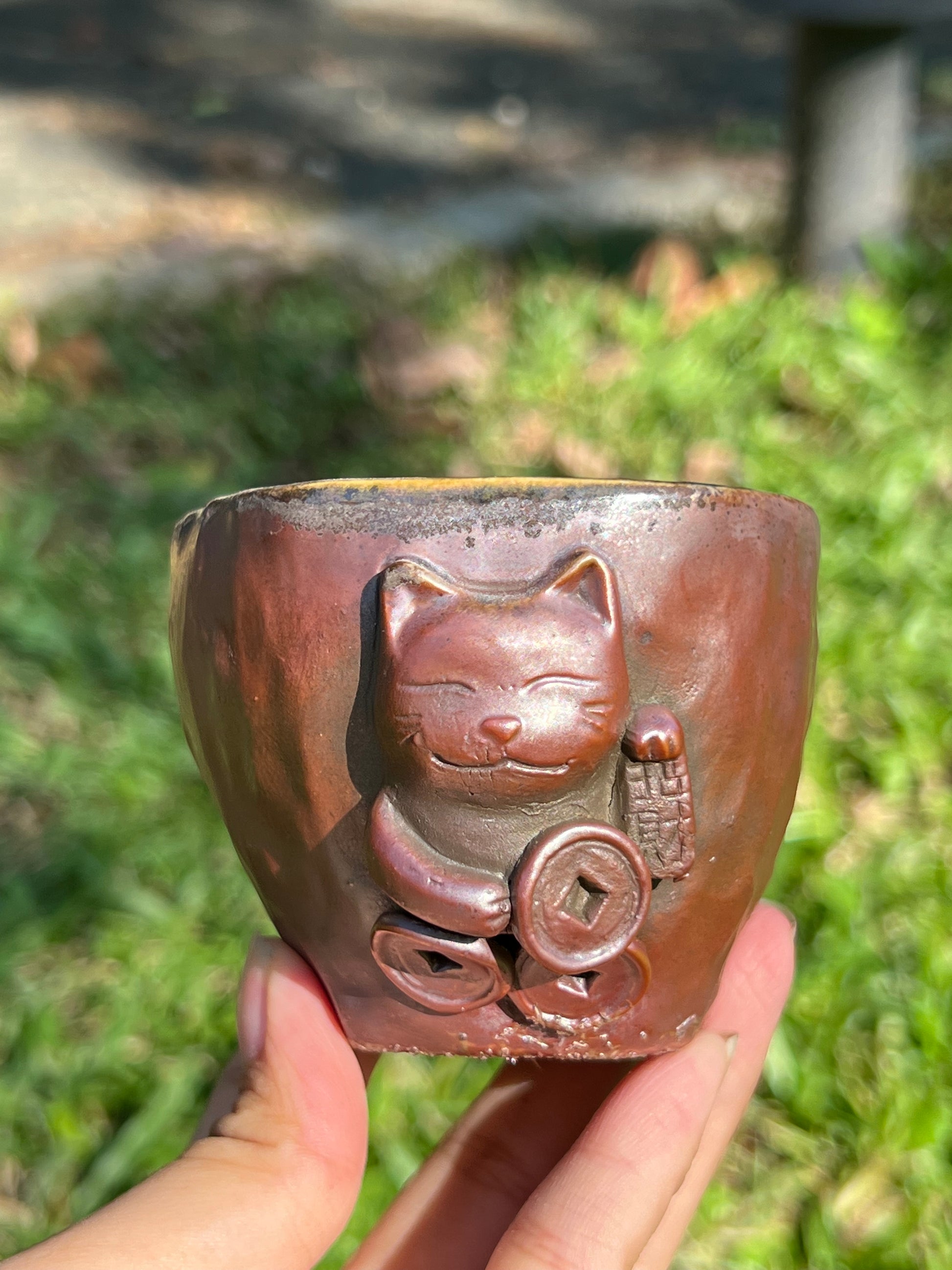 This is a woodfired tietai pottery teacup