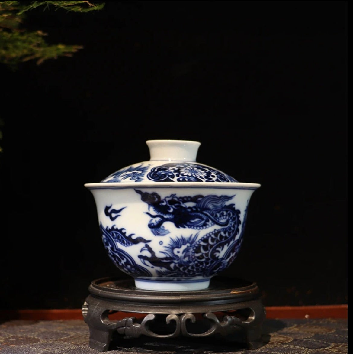 This is a Chinese Jingdezhen blue and white porcelain dragon teapot gaiwan