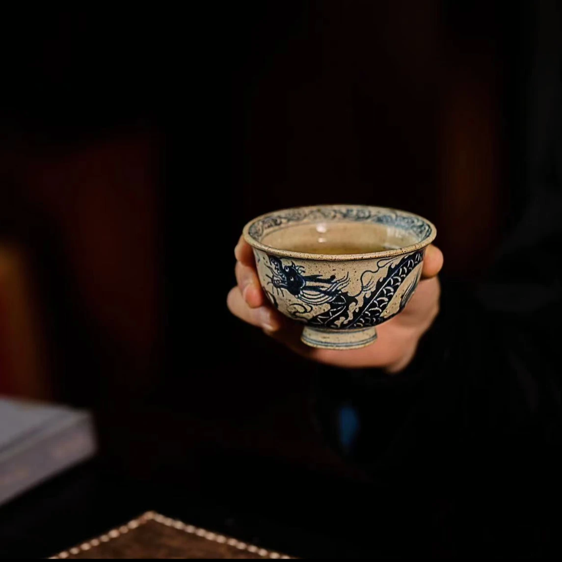 This is a Chinese Jingdezhen blue and white pottery dragon teapot gaiwan