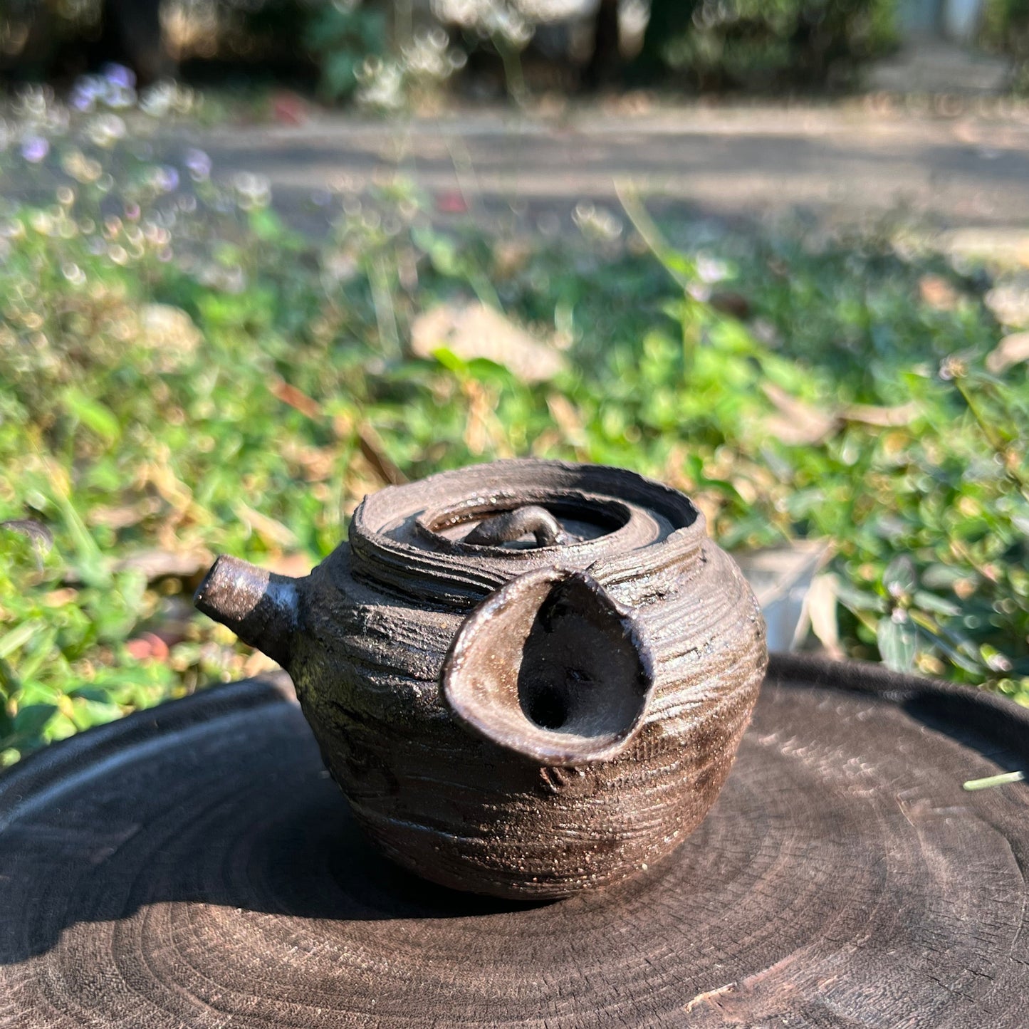 This is a purple clay teapot