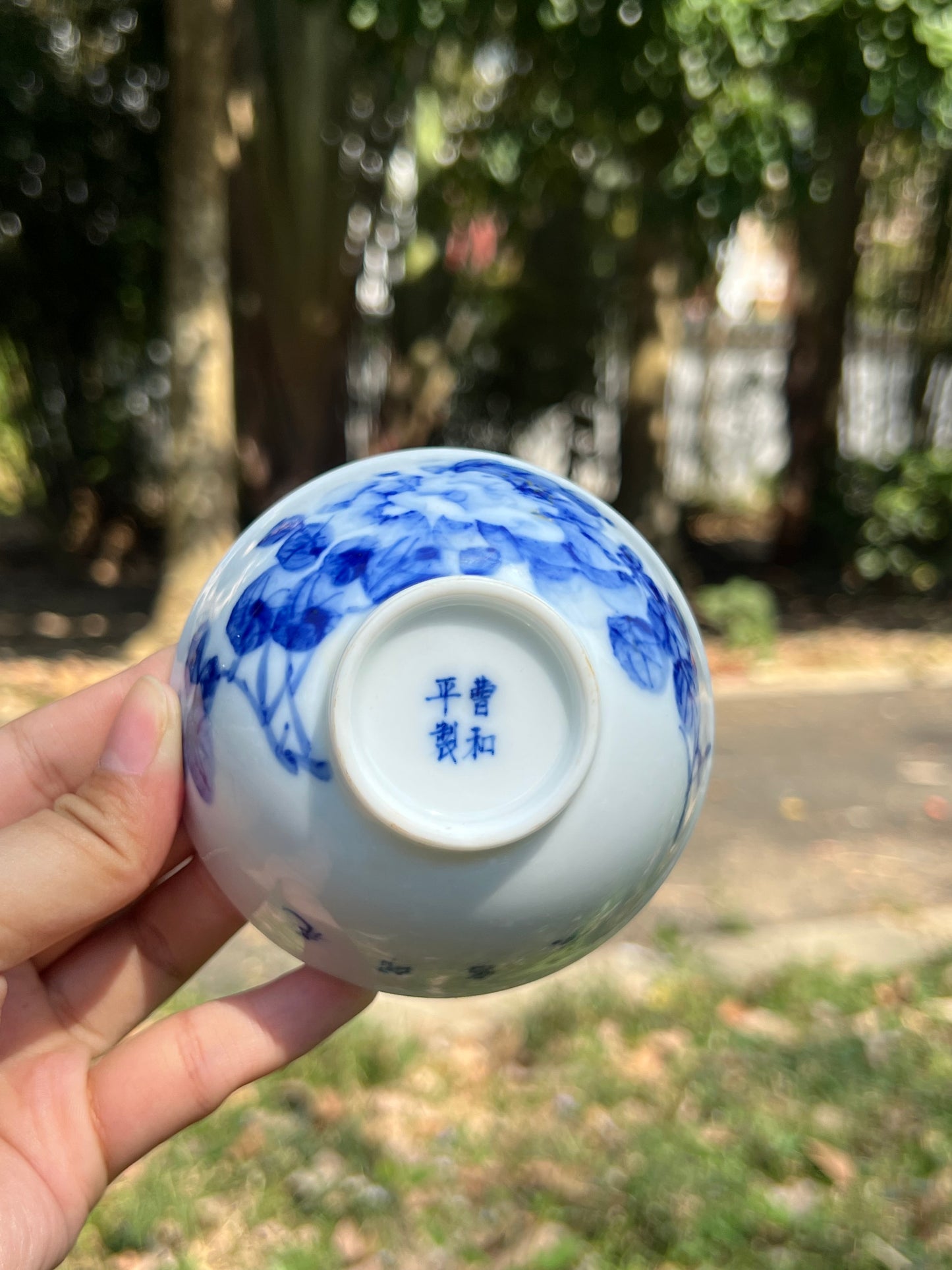 This is a Chinese Jingdezhen blue and white porcelain landscape teacup