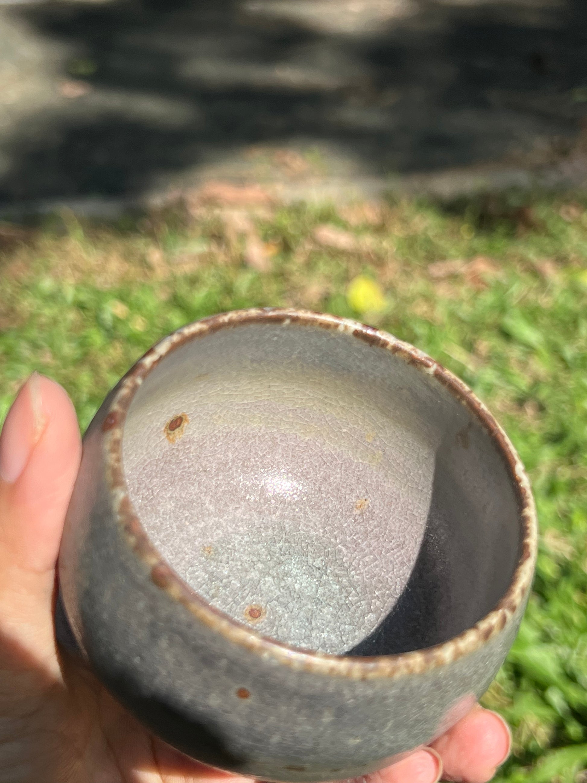 This is a pottery teacup