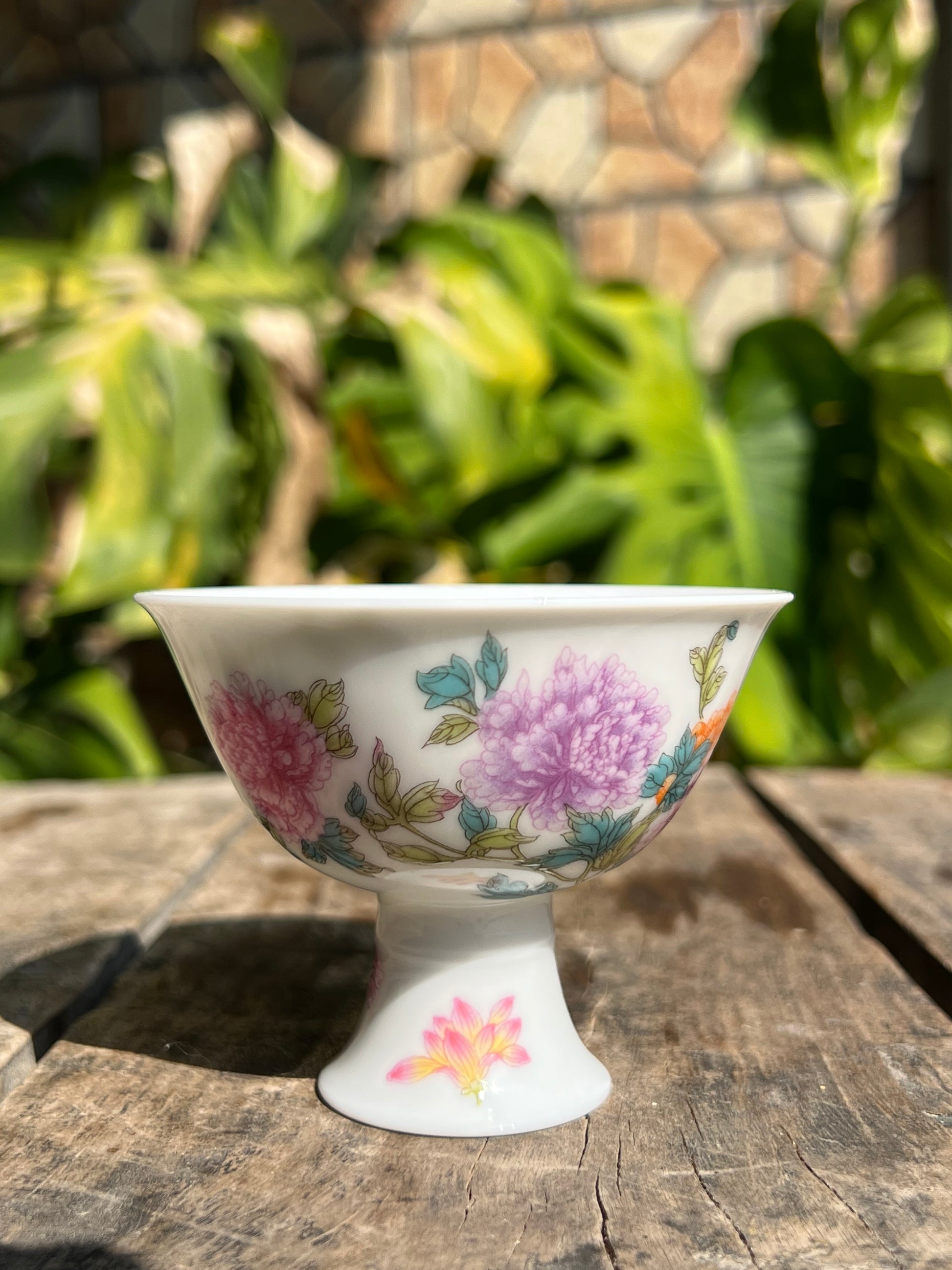 This is a Chinese Jingdezhen enamel flower teacup