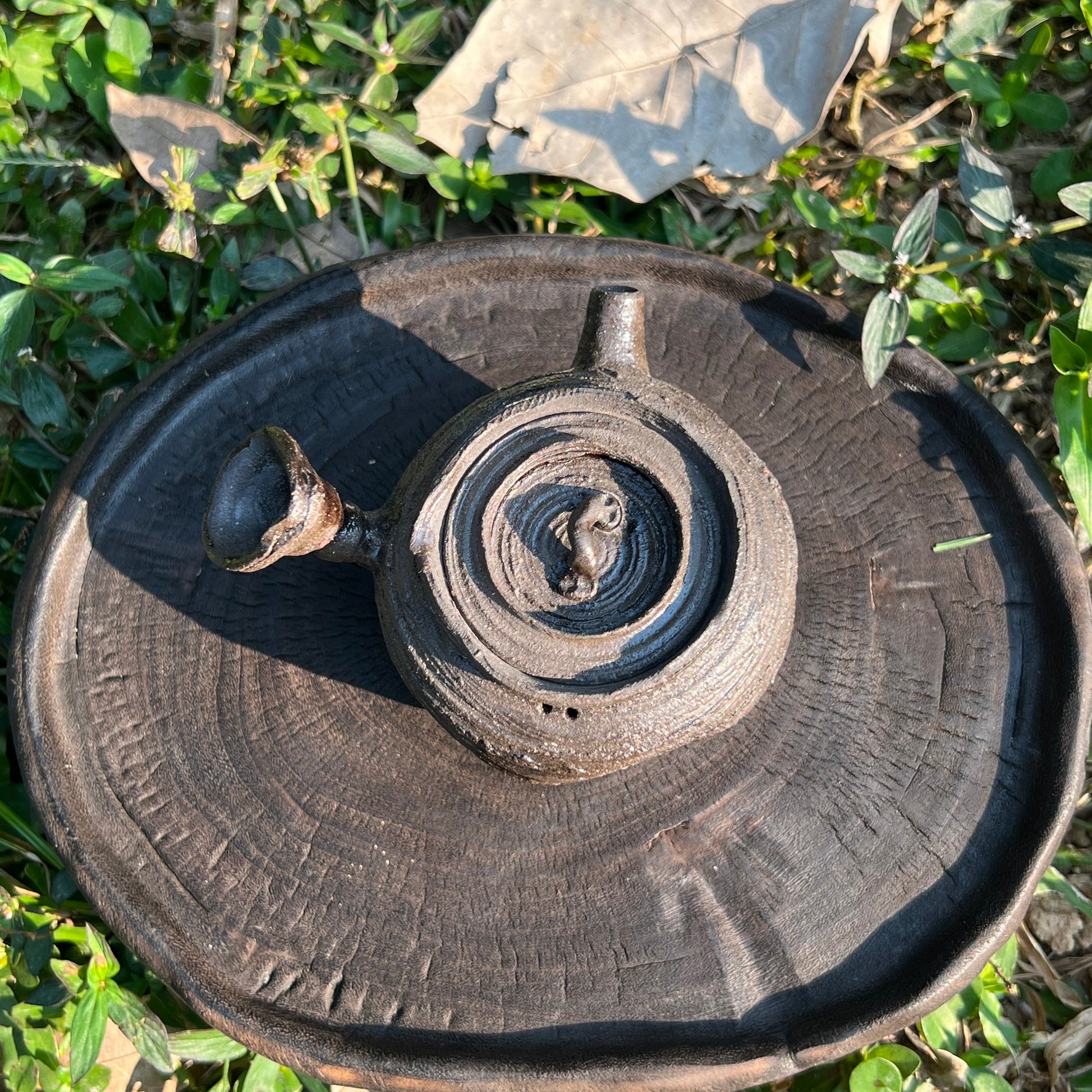 This is a purple clay teapot