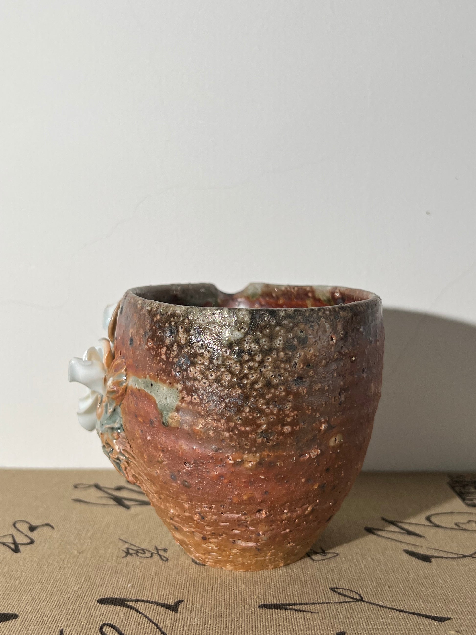 This is a woodfired pottery flower faircup gongdaobei