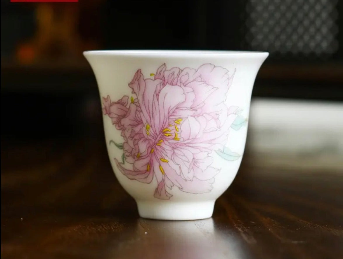 This is a Chinese Jingdezhen pastel flower teacup