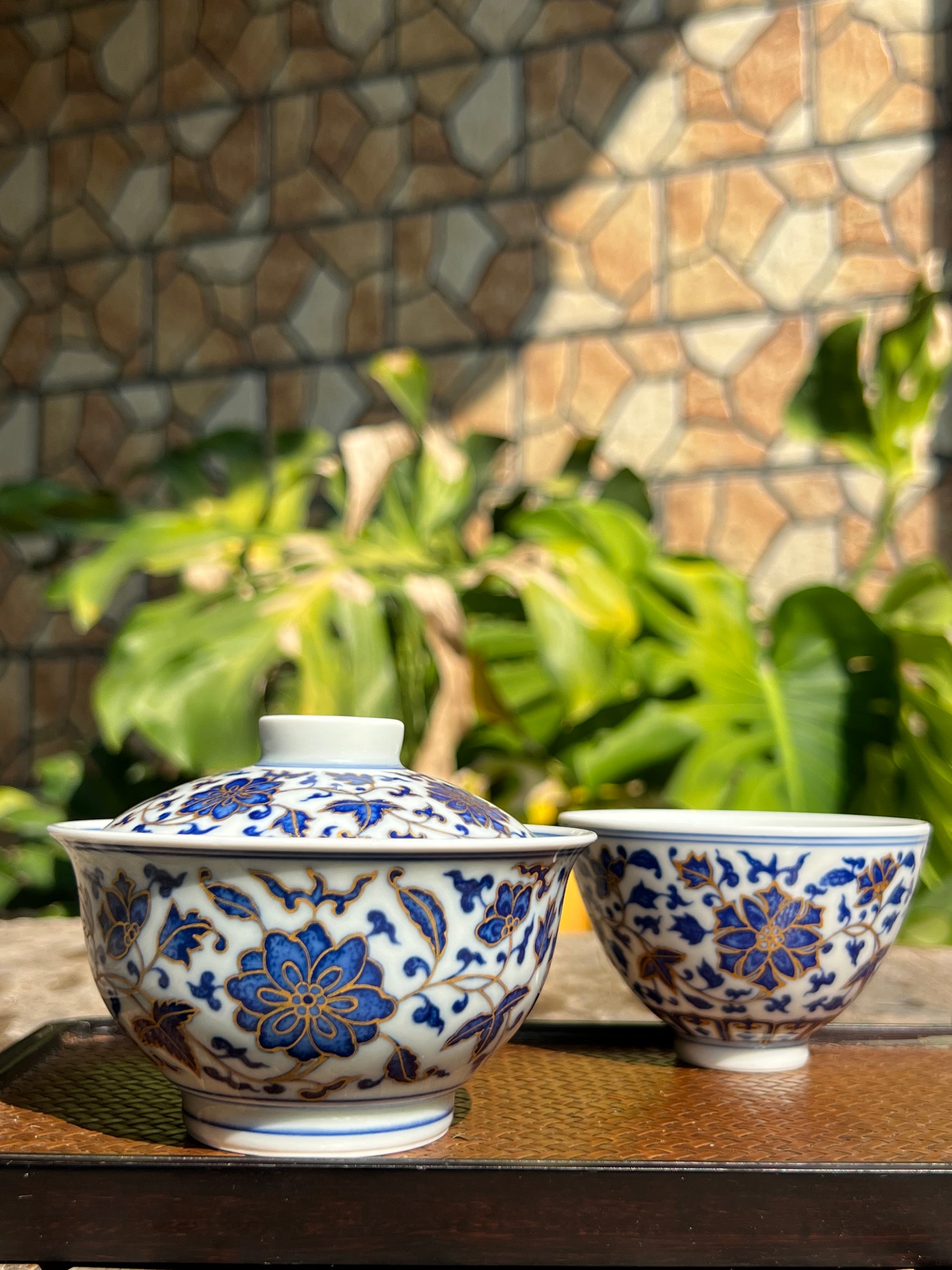 This is a Chinese Jingdezhen blue and white porcelain flower teapot gaiwan