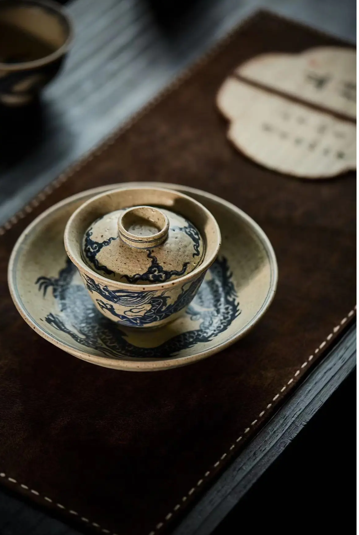 This is a Chinese Jingdezhen blue and white pottery dragon teapot gaiwan