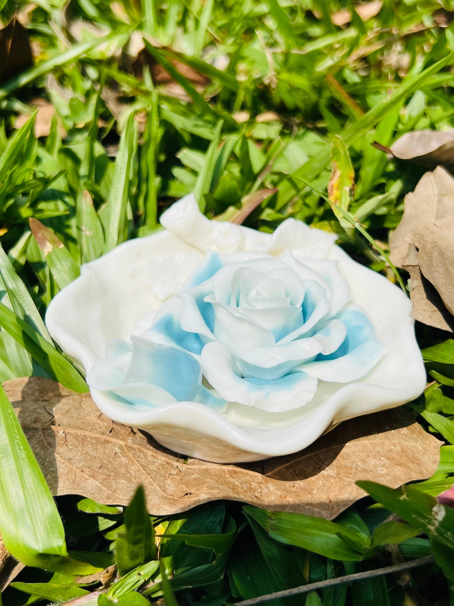 this is a woodfired white fine pottery flower teacup