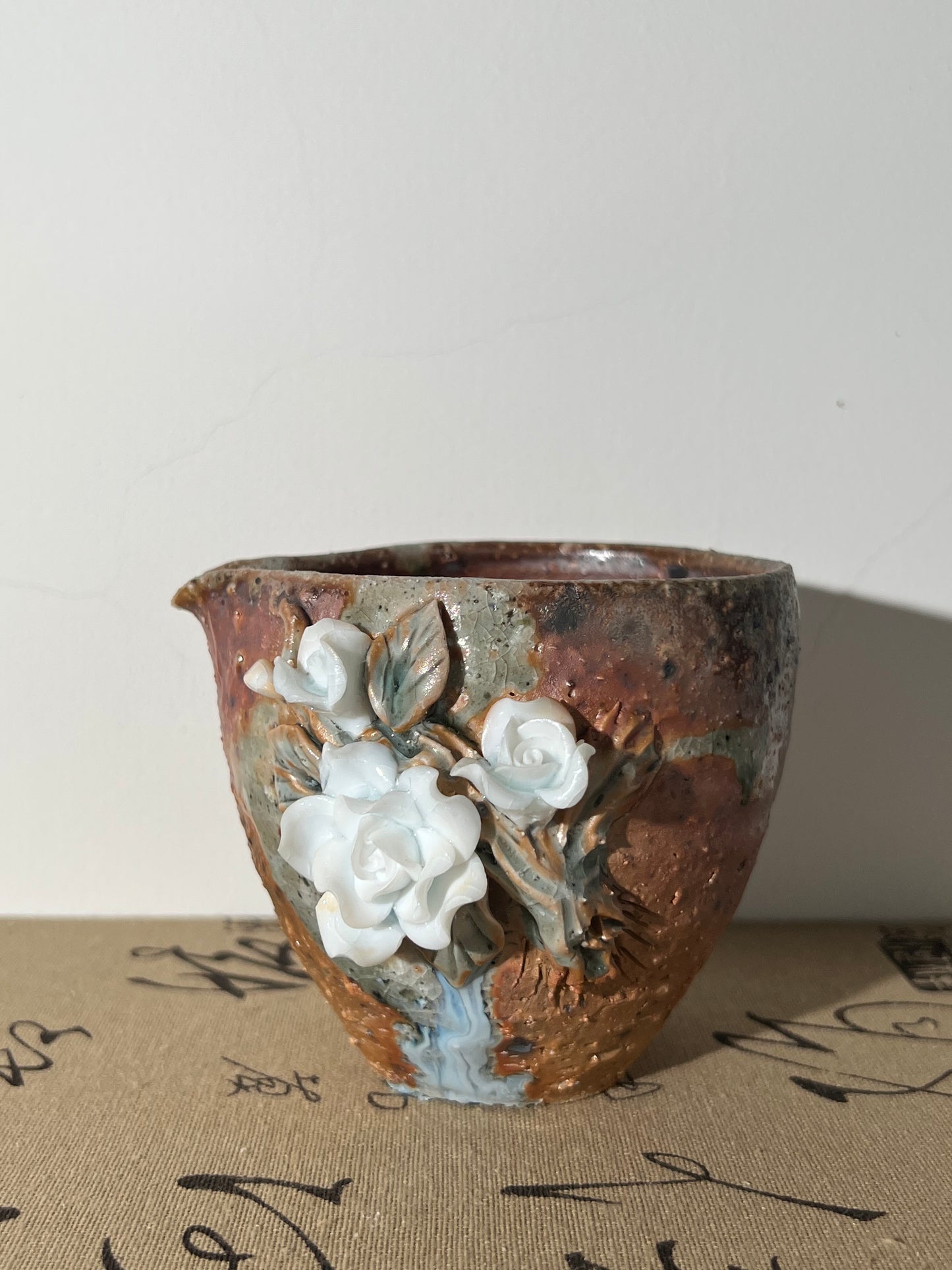 This is a woodfired pottery flower faircup gongdaobei