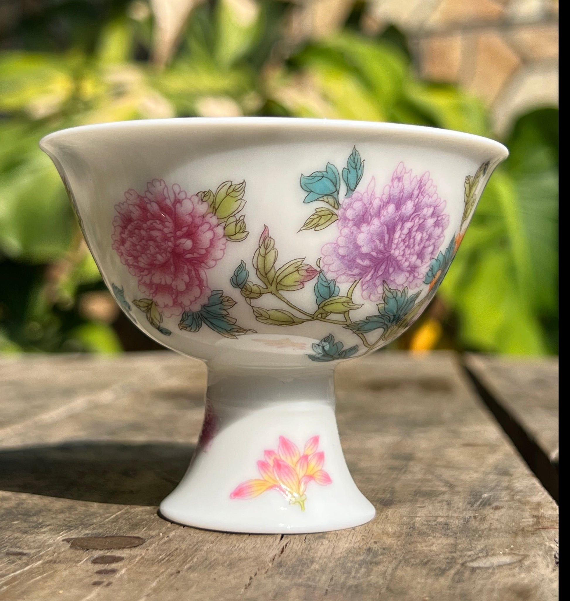 This is a Chinese Jingdezhen enamel flower teacup