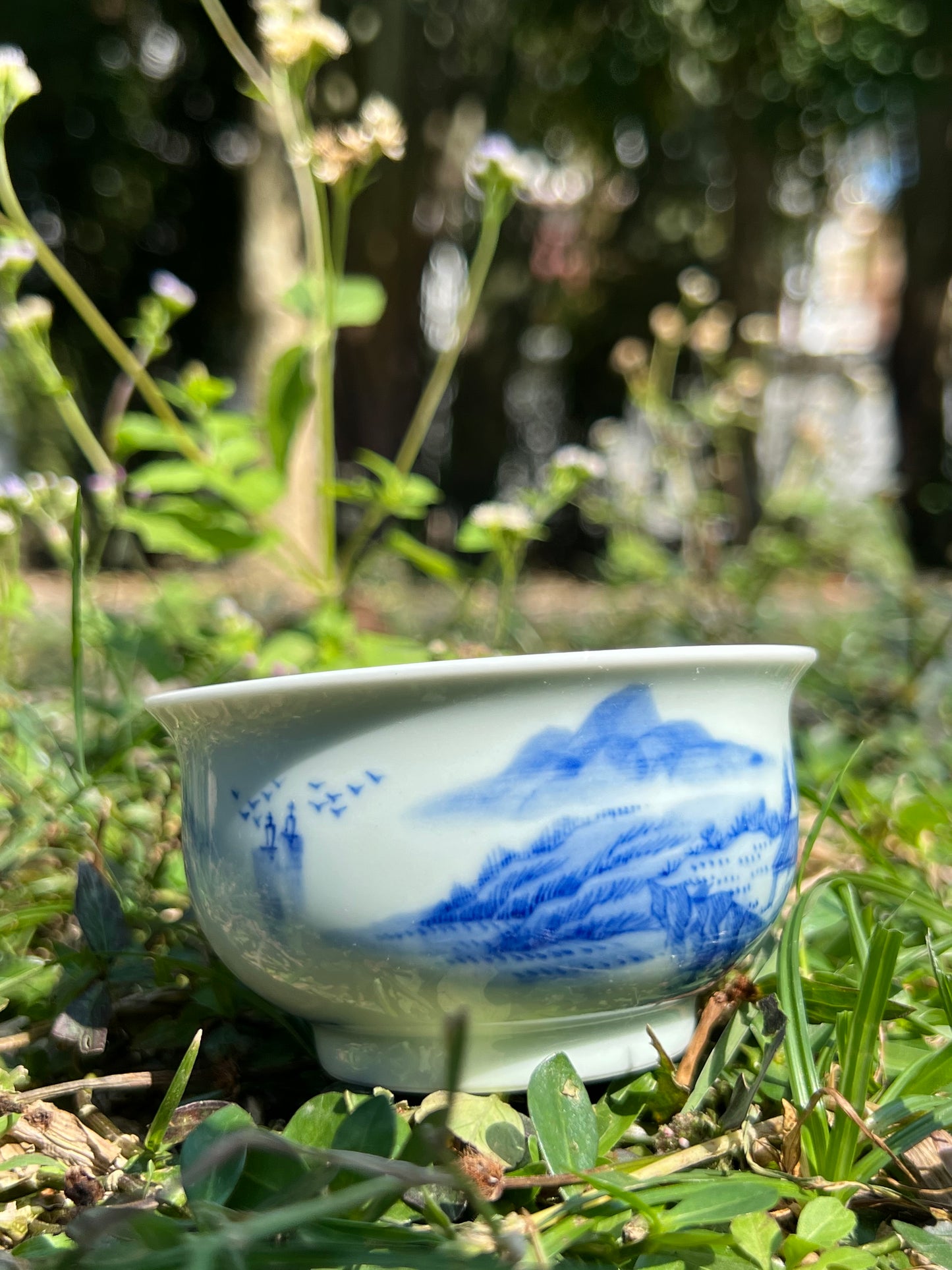 This is a Chinese Jingdezhen blue and white porcelain landscape teacup