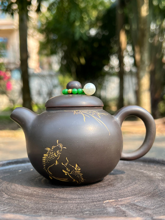 This is a Nixing teapot.this is a Chinese Nixing pottery clay teapot