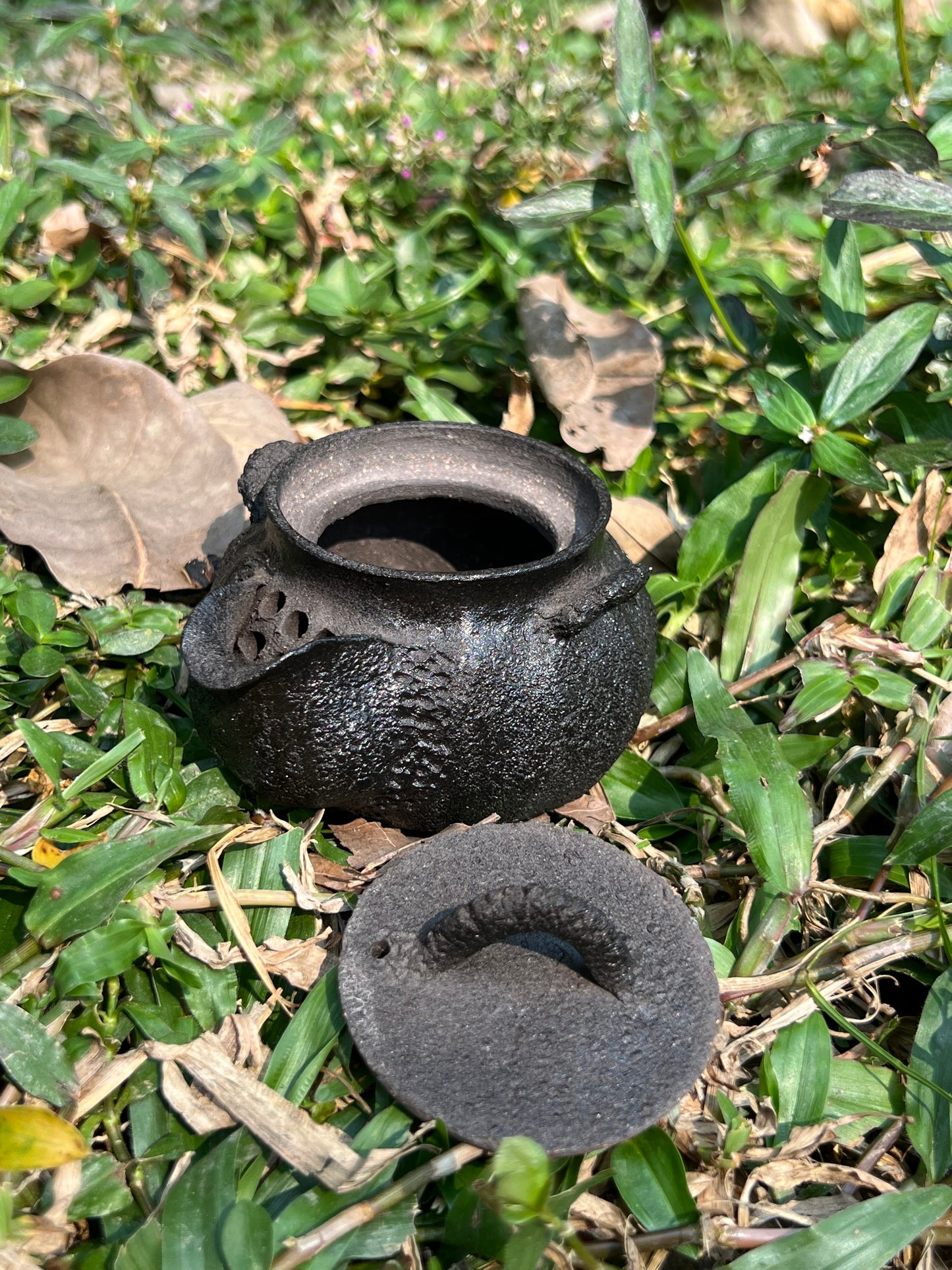 This is a purple clay teapot 